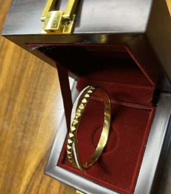 Upgrade your accessory game with this Trendy Gold-Plated Bracelet, designed for the modern woman who loves style with comfort. Featuring a sleek, glossy gold finish and a minimalist design, this bracelet adds a touch of elegance to both traditional and western outfits. Its lightweight structure makes it perfect for daily wear as well as special occasions. Whether you're heading to a party, office, or festive celebration, this bracelet is the perfect go-to piece to complete your look. ✅ Elegant gold-plated finish ✅ Stylish and modern design ✅ Lightweight & comfortable for all-day wear ✅ Suitable for daily, party & festive use ✅ Pairs beautifully with Indian and Western outfits